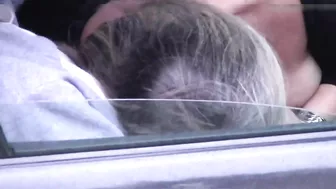 Caught on camera a woman giving blowjob to a stranger in car
