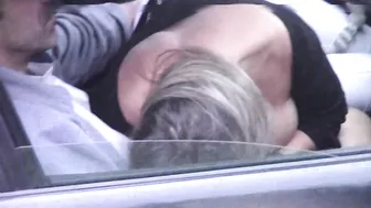 Caught on camera a woman giving blowjob to a stranger in car