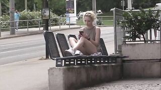 Exhibitionist blonde girl flashing her shaved pussy in public places