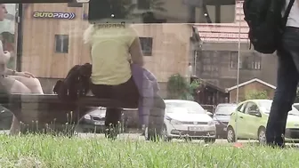 Exhibitionist blonde girl flashing her shaved pussy in public places