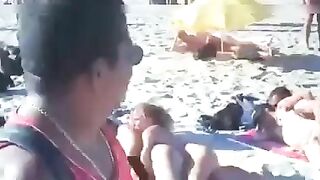 Nudist couples filmed fucking on the beach