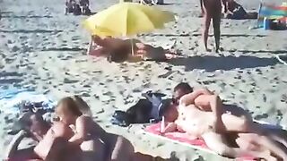 Nudist couples filmed fucking on the beach