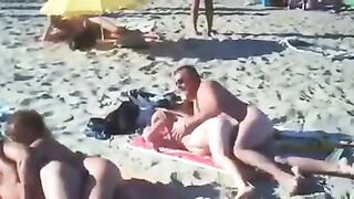 Nudist couples filmed fucking on the beach