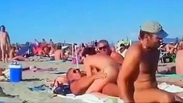 Nudist couples filmed fucking on the beach