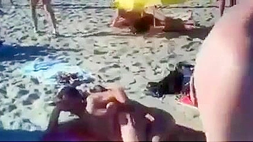 Nudist couples filmed fucking on the beach