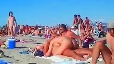 Nudist couples filmed fucking on the beach