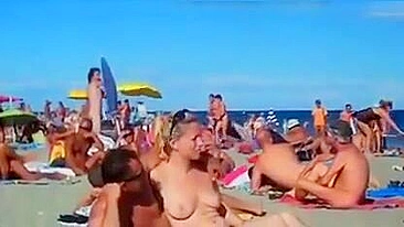 Nudist couples filmed fucking on the beach