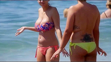 Topless Women With Stunningly Huge Breasts On The Beach