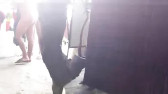 Sneaky Cameraman Captures Exposed Nude Women In Beach Shower Stalls