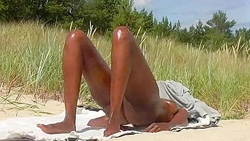 Beautiful Black Girl's Naked, Oiled Body Sizzles At The Beach