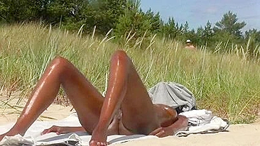 Beautiful Black Girl's Naked, Oiled Body Sizzles At The Beach