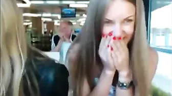 Two Stunning Topless Babes Flaunting Their Hot Assets In A Public Spot