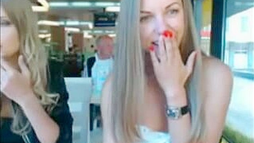 Two Stunning Topless Babes Flaunting Their Hot Assets In A Public Spot