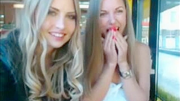 Two Stunning Topless Babes Flaunting Their Hot Assets In A Public Spot