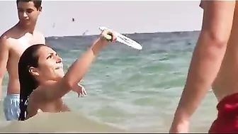 Sexy Topless Girl at the Beach