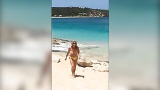 Sexy, Sun-Kissed, Mature Wife Flaunts Her Topless Curves At The Beach