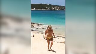 Sexy, Sun-Kissed, Mature Wife Flaunts Her Topless Curves At The Beach