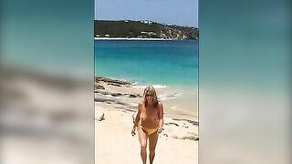 Sexy, Sun-Kissed, Mature Wife Flaunts Her Topless Curves At The Beach