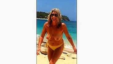 Sexy, Sun-Kissed, Mature Wife Flaunts Her Topless Curves At The Beach