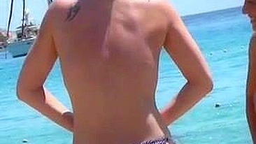 Sun-Kissed, Bikini-Clad Topless Women Tantalize On The Sultry Ibiza Beach