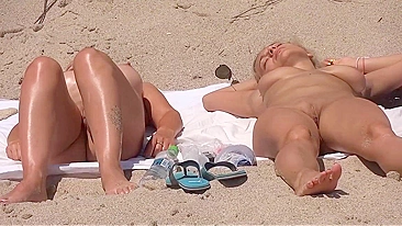 Two Sexily Naked Ladies Secretly Filmed At The Beach