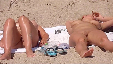 Two Sexily Naked Ladies Secretly Filmed At The Beach