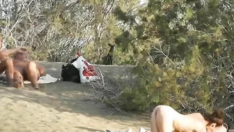 Swinger couples making sex on Spanish beach with nudists