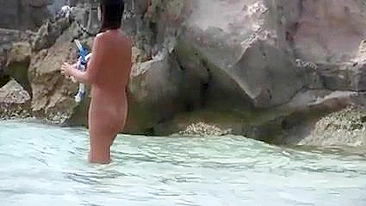 Brunette Woman with Hairy Pussy Nude at the Beach