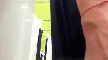 Two horny girls make out in dressing room at mall