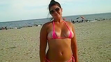 Girl Shows Her Pussy and Ass in Tight Bikini at the Beach