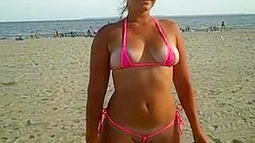 Girl Shows Her Pussy and Ass in Tight Bikini at the Beach