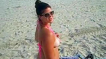 Girl Shows Her Pussy and Ass in Tight Bikini at the Beach