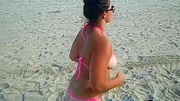 Girl Shows Her Pussy and Ass in Tight Bikini at the Beach