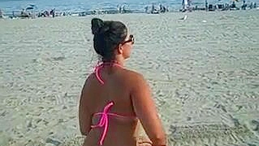 Girl Shows Her Pussy and Ass in Tight Bikini at the Beach