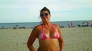 Girl Shows Her Pussy and Ass in Tight Bikini at the Beach