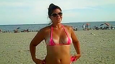 Girl Shows Her Pussy and Ass in Tight Bikini at the Beach