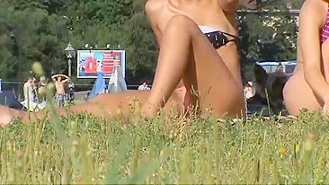 Hidden voyeur spy cam in public hot girl sunbath with small thong