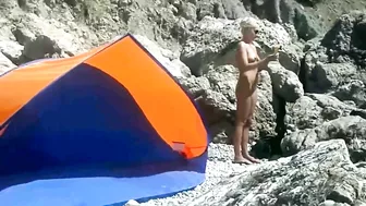 Voyeur Camera at a Secluded Beach Place Naked Woman Filmed