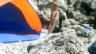 Voyeur Camera at a Secluded Beach Place Naked Woman Filmed