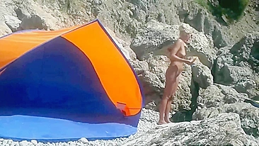 Voyeur Camera at a Secluded Beach Place Naked Woman Filmed