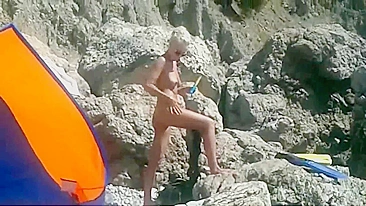 Voyeur Camera at a Secluded Beach Place Naked Woman Filmed