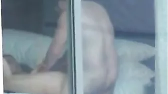 Voyeur sex couple caught fucking by the window - real public exposure and fucking in public video.