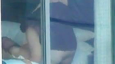 Voyeur sex couple caught fucking by the window - real public exposure and fucking in public video.