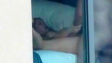 Voyeur sex couple caught fucking by the window - real public exposure and fucking in public video.