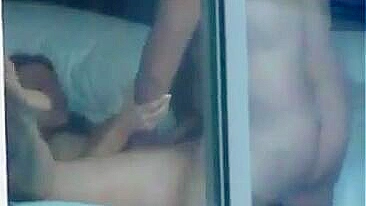 Voyeur sex couple caught fucking by the window - real public exposure and fucking in public video.