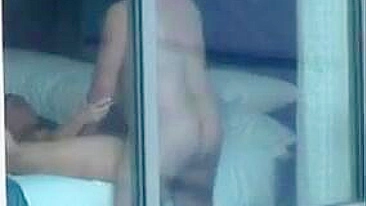 Voyeur sex couple caught fucking by the window - real public exposure and fucking in public video.