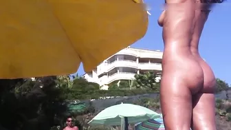 Nudist woman with big ass caught voyeur at the beach