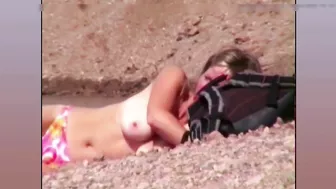 Topless wife filmed at the beach