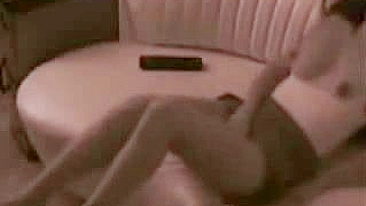 Sultry Mom Secretly Pleasures Herself On Cozy Couch, Caught On Camera!