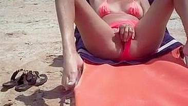 Surreptitiously, The Horny Wife Masturbates At The Beach